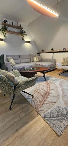 a living room with a coffee table and a couch at Valena 2 - Divčibare Free private Parking in Divčibare