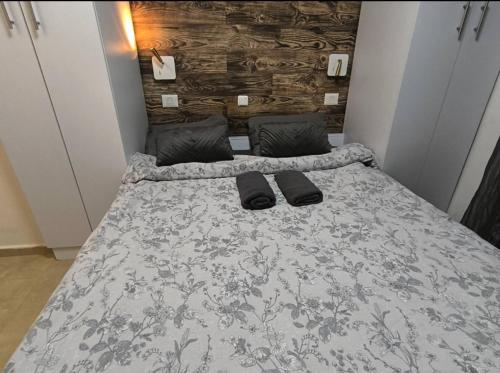 Ένα ή περισσότερα κρεβάτια σε δωμάτιο στο Kasa R