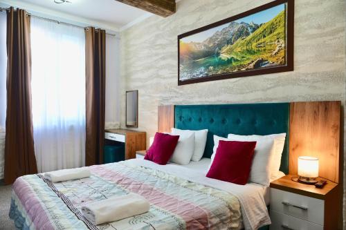 Postel nebo postele na pokoji v ubytování Hotel Halibas