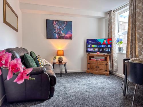 Et tv og/eller underholdning på Spacious 1 Bedroom City Center Flat in Derby