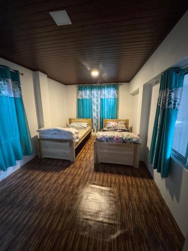 Una cama o camas en una habitación de Sungava homestay