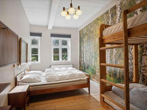 Postel nebo postele na pokoji v ubytování 5 star holiday home in Haderslev