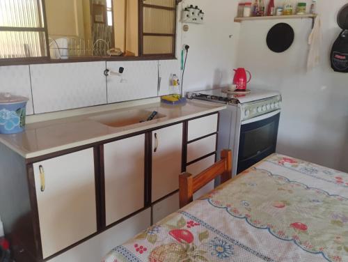 Kuchyň nebo kuchyňský kout v ubytování Rancho cachoeira