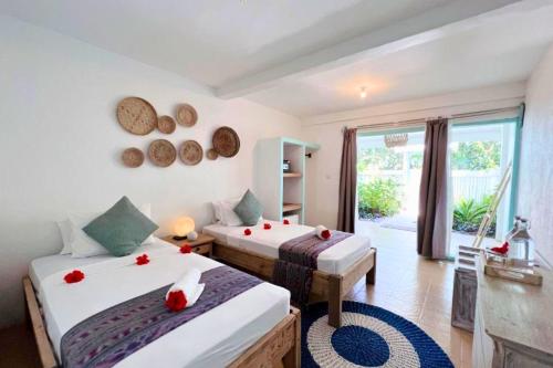 Katil atau katil-katil dalam bilik di Vance 1 BR Superior With Garden View ZN303