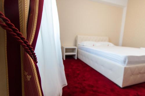 Katil atau katil-katil dalam bilik di Hotel Evianne Boutique