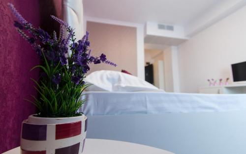 Katil atau katil-katil dalam bilik di Hotel Evianne Boutique