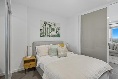 Ένα ή περισσότερα κρεβάτια σε δωμάτιο στο Comfort city view apartment Central Adelaide