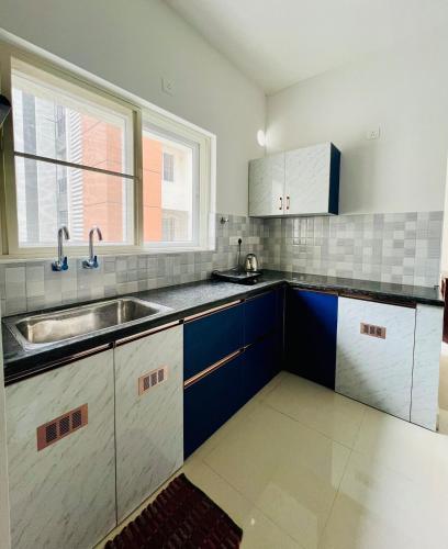 Kuchyň nebo kuchyňský kout v ubytování B 206 LML Home Stay