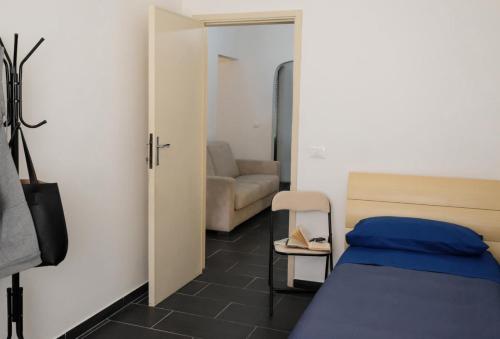 Ένα ή περισσότερα κρεβάτια σε δωμάτιο στο Casa Laura mare