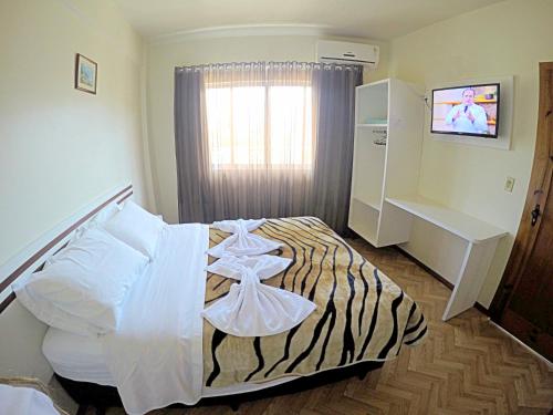 Cama o camas de una habitación en Hotel Schreiber
