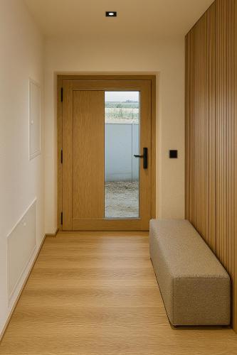 a room with a door with a bed and a window at Appartment Krimmler Bergtraum in Krimml