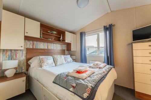 Katil atau katil-katil dalam bilik di Captain's Quarters B67