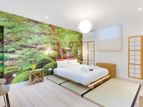 Ένα ή περισσότερα κρεβάτια σε δωμάτιο στο Villa Marilyn proche St Germain en Laye-Versailles