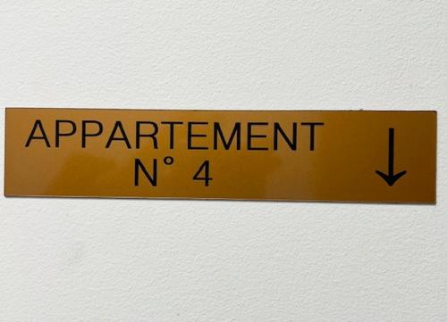 a sign that reads agreement no on a wall at Cosy 2 pièces terrasse 15 minutes de Paris in Bagneux