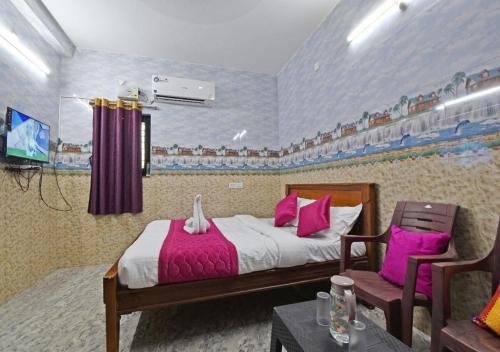 Postel nebo postele na pokoji v ubytování paradise beach resort pondicherry