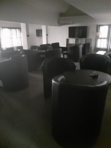 TV a/nebo společenská místnost v ubytování Orange Residence and Suites