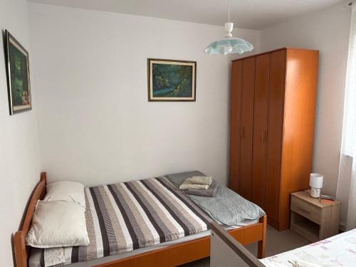 Ένα ή περισσότερα κρεβάτια σε δωμάτιο στο Nemira IX 12 Vacations