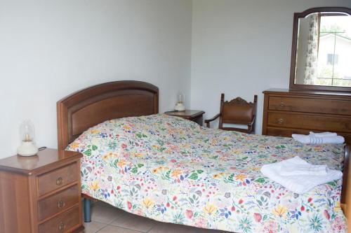 Ένα ή περισσότερα κρεβάτια σε δωμάτιο στο Ca' D'la Pèisa