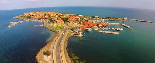 an aerial view of a small island in the water at The White Houses 7 in Nesebar