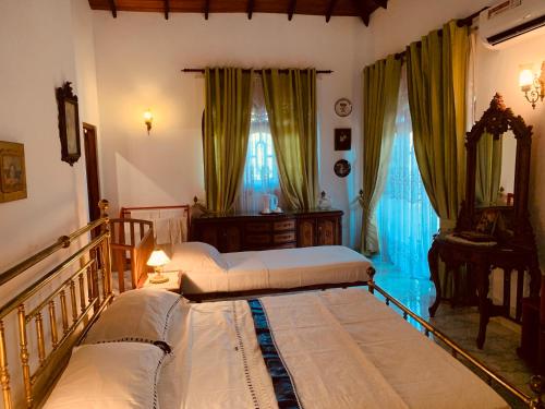 Ένα ή περισσότερα κρεβάτια σε δωμάτιο στο Fair Heaven Villa