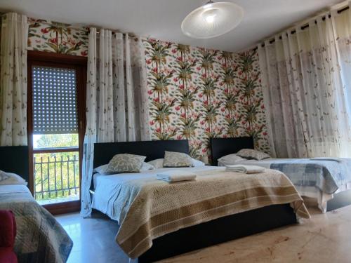 Ένα ή περισσότερα κρεβάτια σε δωμάτιο στο Venice Holiday Apartment