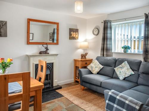 Χώρος καθιστικού στο Bullions Farm Cottage