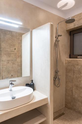 a bathroom with a sink and a shower at Villa Elaia Luxury Villa with Private Pool & Sea View in Sitia