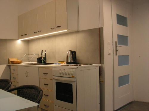 Kitchen o kitchenette sa Apartament Moonlight