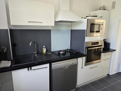 Køkken eller tekøkken på Evasion Marine Plage Terrasse parking clim