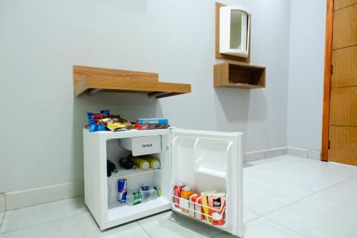 Køkken eller tekøkken på Pousada Malibu 116