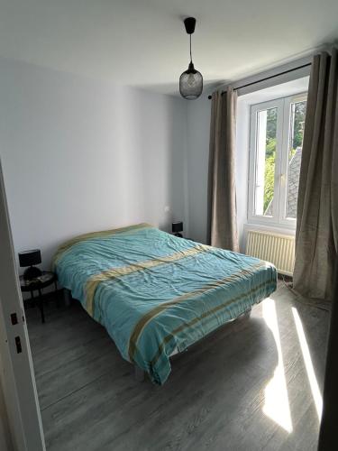 Ένα ή περισσότερα κρεβάτια σε δωμάτιο στο Appart-loz