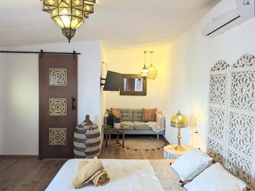 Postel nebo postele na pokoji v ubytování La Chocita del Jarama