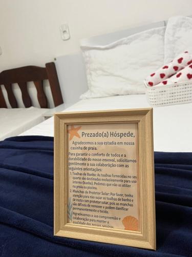 Postel nebo postele na pokoji v ubytování Casinha aconchegante à beira-mar