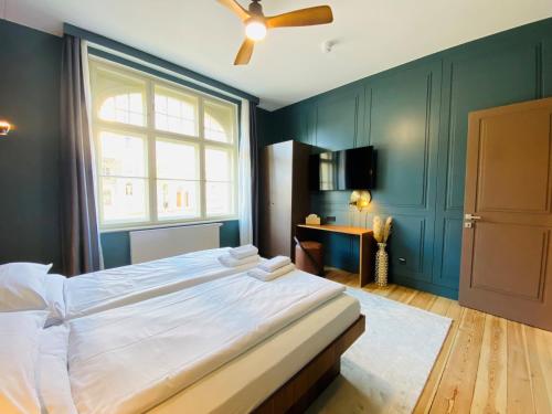 Postel nebo postele na pokoji v ubytování Amaroo - Apartments "Regia"