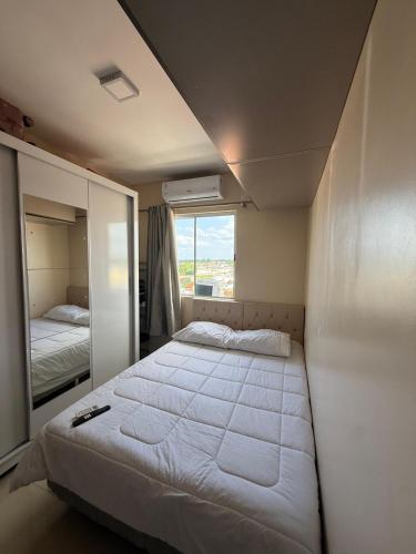 En eller flere senge i et værelse på Apartment COP 30 Belém - Brazil