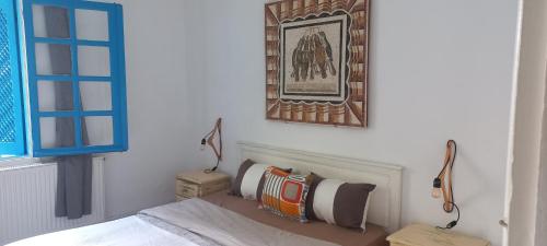 Ένα ή περισσότερα κρεβάτια σε δωμάτιο στο Cristal Majorelle à sidi Bou said