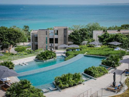 an overhead view of a swimming pool at a resort at Sofitel Barú Cartagena in Cartagena de Indias