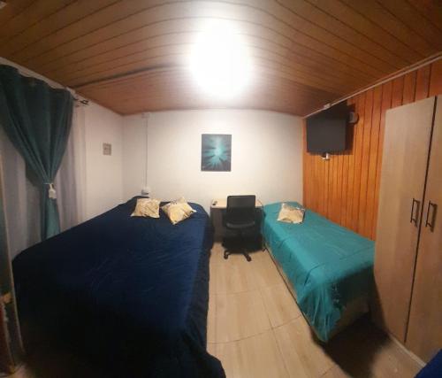 Postel nebo postele na pokoji v ubytování Departamento Jardin