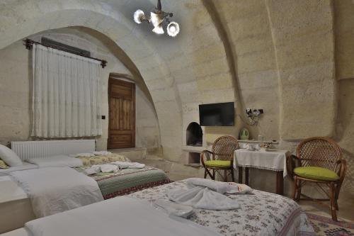 Lova arba lovos apgyvendinimo įstaigoje View Cave Hotel