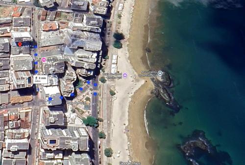 an aerial view of a beach next to the water at Perto do peixe Marley - Praia do Morro in Guarapari