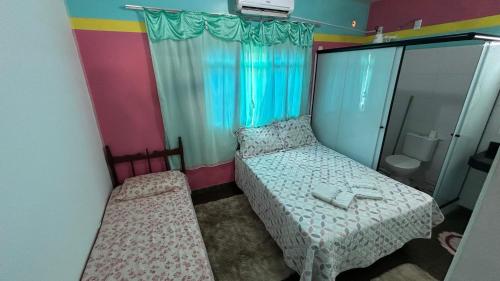 Letto o letti in una camera di Aráras Suites