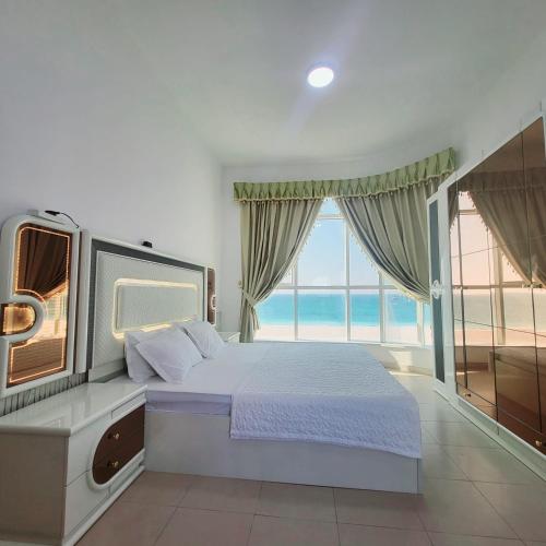 Llit o llits en una habitació de Beachfront Holiday Homes