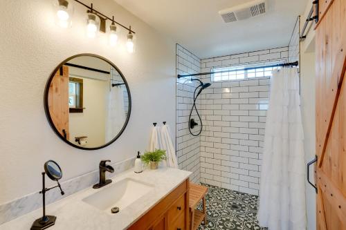 a bathroom with a sink and a mirror at Charming Lodi Retreat Walk to Local Wineries in Lodi