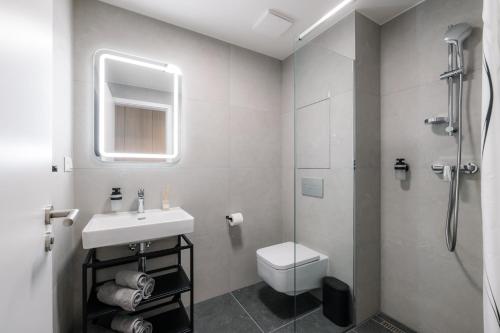 Ένα μπάνιο στο NEW Comfort Business Apartment