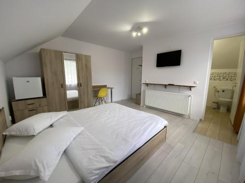 En eller flere senge i et værelse på La Cheia