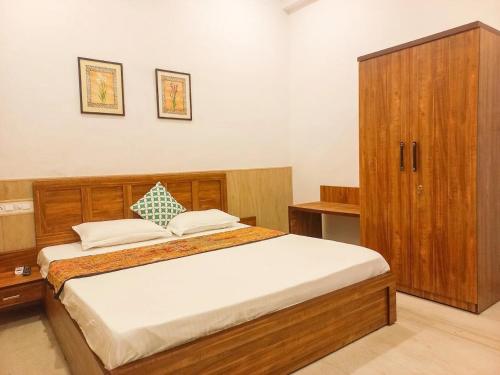 Postel nebo postele na pokoji v ubytování The Nivas