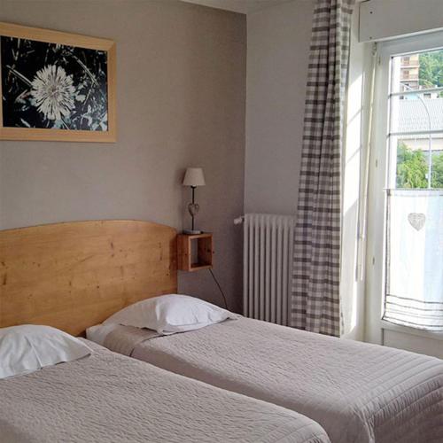 Llit o llits en una habitació de Chambre Arbonne Maison