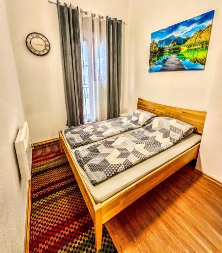 a bedroom with a bed in a room at Apartman RAJAN Vlašić in Vlasic