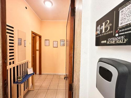 a hallway with a entrance to a home exit at HOME BUCISCA- Your days of relaxation in CTA