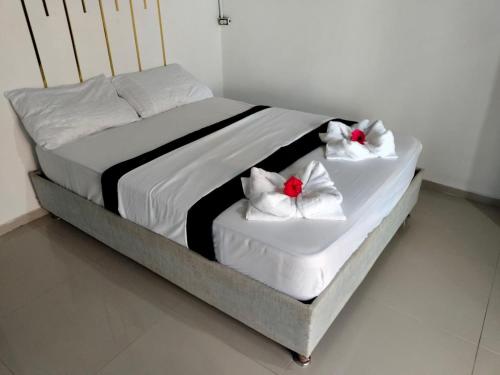 Giường trong phòng chung tại Casa sol palomino